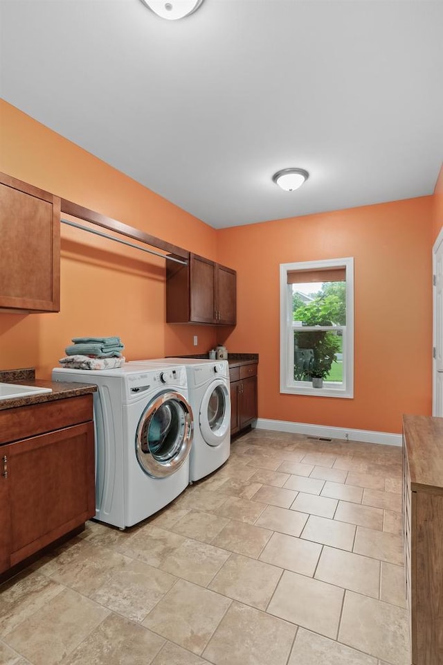4790 Innovation Dr, Deforest, WI 53532 - washroom with cabinet space and washing machine and dryer