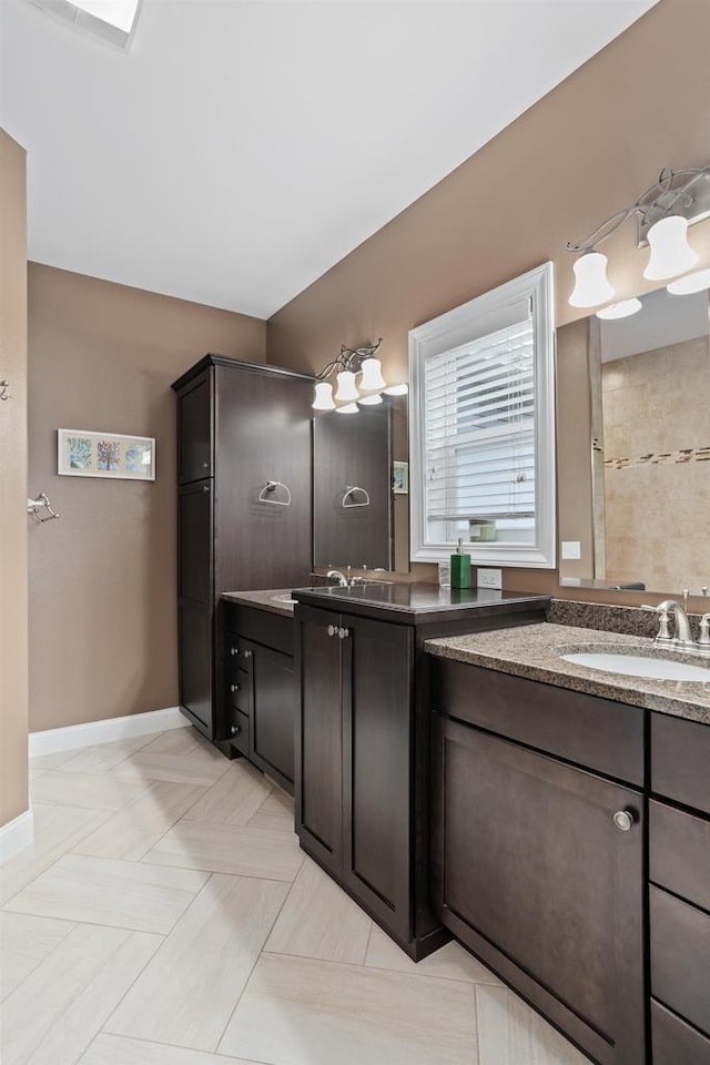 4790 Innovation Dr, Deforest, WI 53532 - bathroom with vanity and baseboards