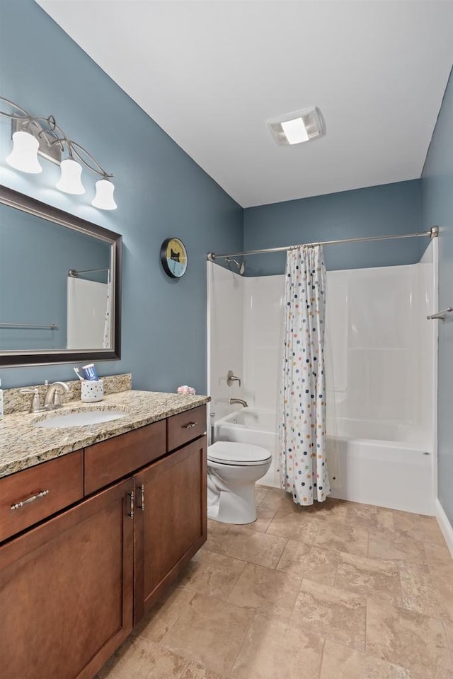 4790 Innovation Dr, Deforest, WI 53532 - full bathroom featuring shower / bath combination with curtain, vanity, and stone finish floors