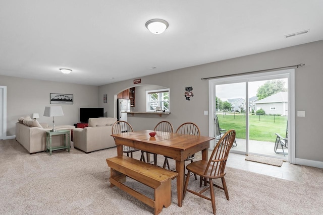 4790 Innovation Dr, Deforest, WI 53532 - dining room featuring arched walkways and light carpet