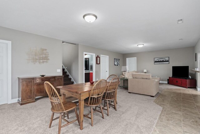 4790 Innovation Dr, Deforest, WI 53532 - dining room with stairway and light carpet