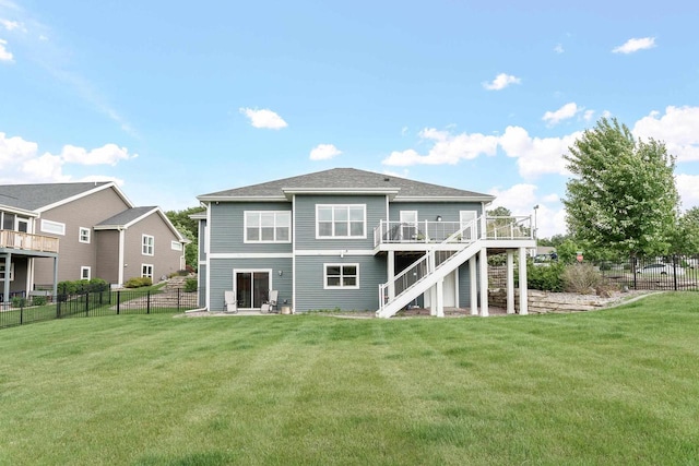 4790 Innovation Dr, Deforest, WI 53532 - rear view of house with stairway, a wooden deck, and a fenced backyard