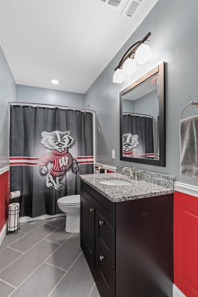 4790 Innovation Dr, Deforest, WI 53532 - bathroom with vanity and a shower with curtain