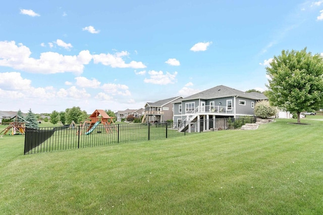 4790 Innovation Dr, Deforest, WI 53532 - view of yard featuring a playground, stairway, and a wooden deck