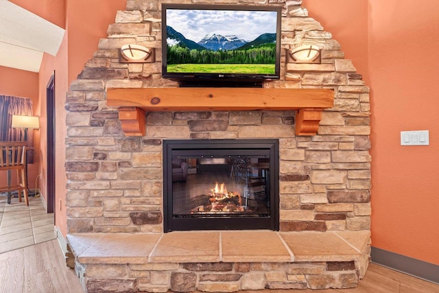 2411 River Rd Unit 2311, Wisconsin Dells, WI 53965 - detailed view of wood finished floors and a fireplace