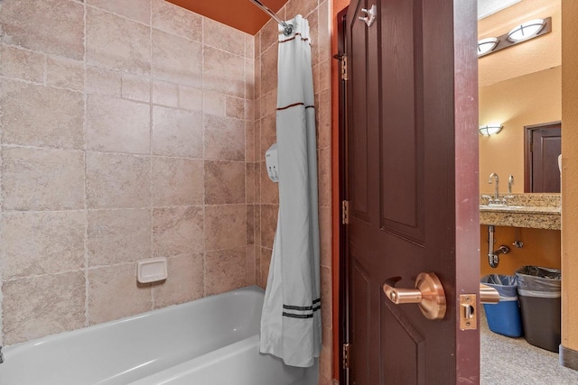 2411 River Rd Unit 2311, Wisconsin Dells, WI 53965 - bathroom with shower / bath combo with shower curtain and a sink