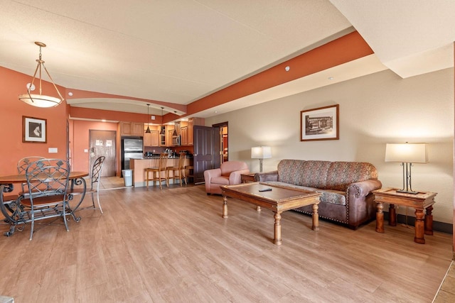 2411 River Rd Unit 2311, Wisconsin Dells, WI 53965 - living area with light wood finished floors and arched walkways