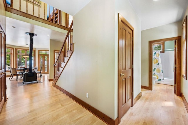 1124 Garrett Bay Rd, Ellison Bay, WI 54210 - hallway featuring light wood-style floors, plenty of natural light, and stairway
