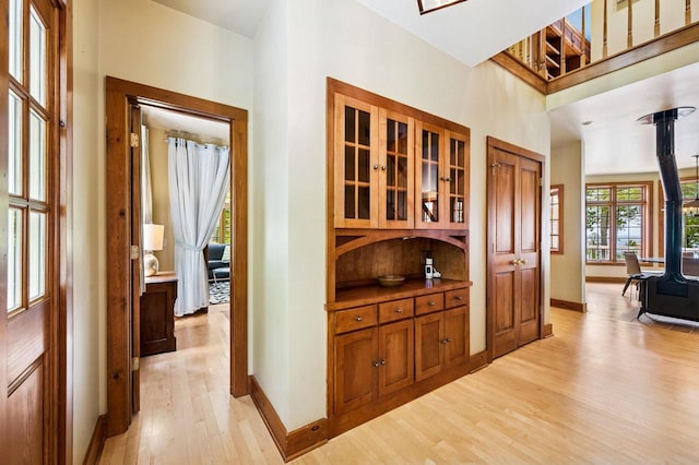 1124 Garrett Bay Rd, Ellison Bay, WI 54210 - hallway featuring light wood-style floors and baseboards
