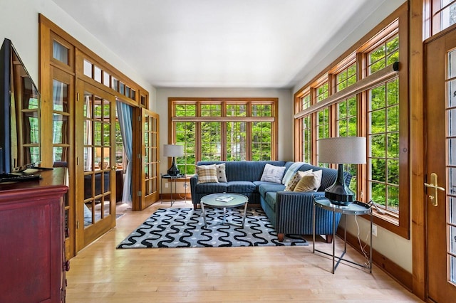 1124 Garrett Bay Rd, Ellison Bay, WI 54210 - sunroom featuring healthy amount of natural light, french doors, and hardwood / wood-style flooring