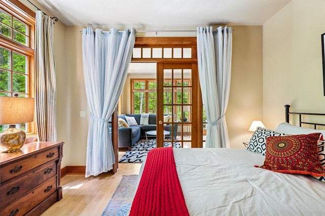 1124 Garrett Bay Rd, Ellison Bay, WI 54210 - bedroom featuring light wood-style floors and baseboards