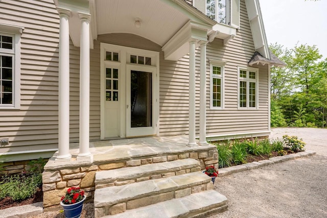 1124 Garrett Bay Rd, Ellison Bay, WI 54210 - view of exterior entry featuring covered porch