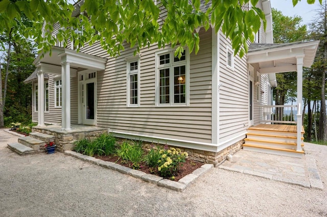 1124 Garrett Bay Rd, Ellison Bay, WI 54210 - view of front of property featuring covered porch