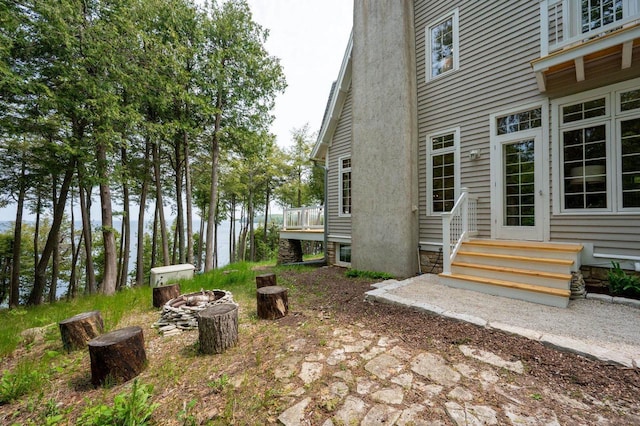1124 Garrett Bay Rd, Ellison Bay, WI 54210 - view of yard with entry steps and a fire pit