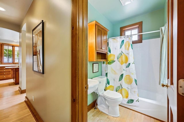 1124 Garrett Bay Rd, Ellison Bay, WI 54210 - full bath featuring wood finished floors, shower / bath combo, and recessed lighting