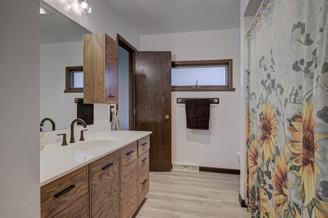 N9695 Willard Rd, Berlin, WI 54923 - bathroom featuring vanity and wood finished floors