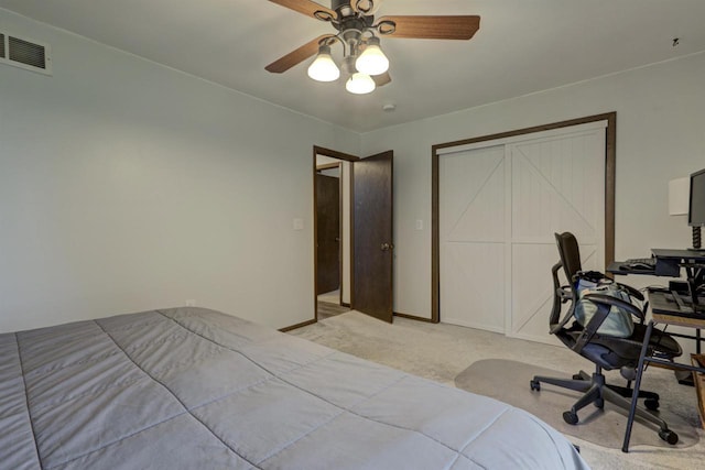 N9695 Willard Rd, Berlin, WI 54923 - bedroom featuring light carpet, a desk, a ceiling fan, and a closet