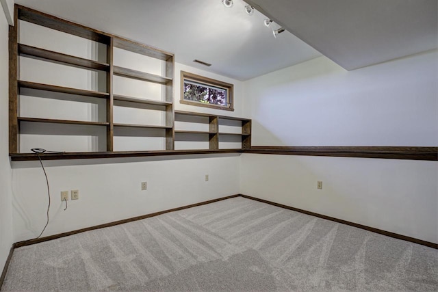 N9695 Willard Rd, Berlin, WI 54923 - empty room with carpet flooring and track lighting
