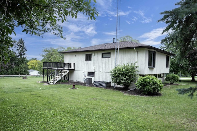 N9695 Willard Rd, Berlin, WI 54923 - back of house featuring stairs, a wooden deck, and a yard