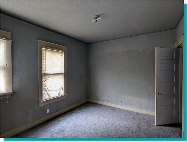 3623 N 1st St Unit 3623A, Milwaukee, WI 53212 - carpeted spare room with baseboards and a textured ceiling
