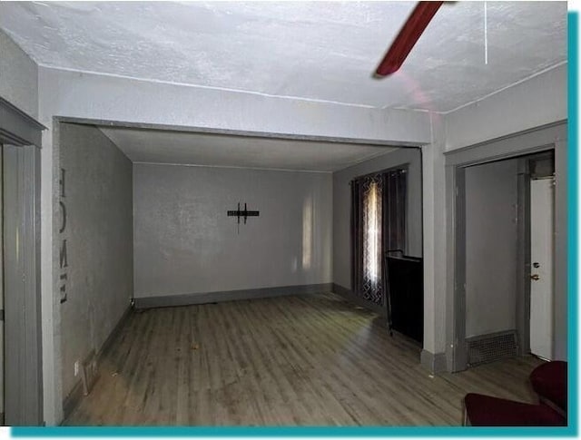 3623 N 1st St Unit 3623A, Milwaukee, WI 53212 - unfurnished room featuring wood finished floors and baseboards