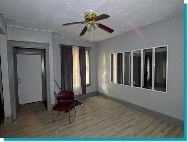 3623 N 1st St Unit 3623A, Milwaukee, WI 53212 - unfurnished room with wood finished floors and a ceiling fan