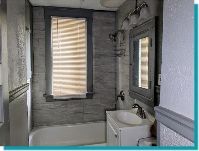 3623 N 1st St Unit 3623A, Milwaukee, WI 53212 - bathroom featuring vanity and tub / shower combination
