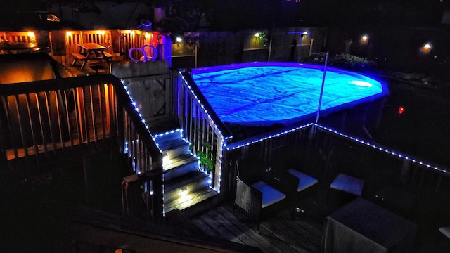 152 Hoyt St, Fond Du Lac, WI 54935 - pool at night featuring an outdoor pool