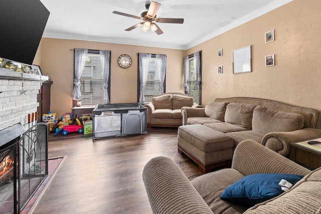 152 Hoyt St, Fond Du Lac, WI 54935 - living room featuring a brick fireplace, wood finished floors, ceiling fan, crown molding, and a textured wall