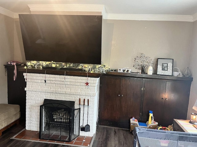 152 Hoyt St, Fond Du Lac, WI 54935 - living room featuring wood finished floors, crown molding, and a brick fireplace
