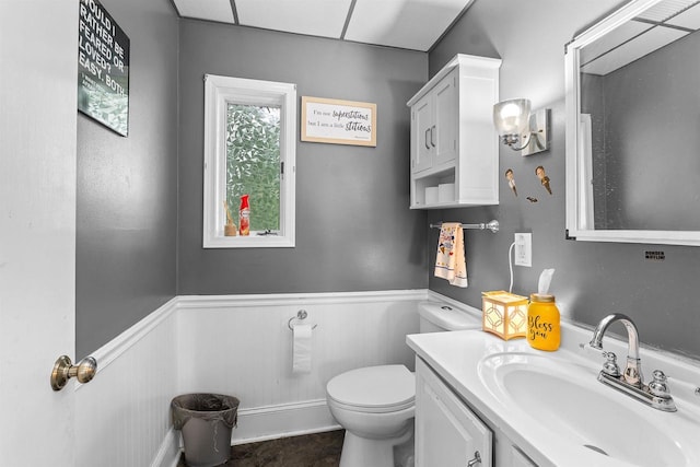 152 Hoyt St, Fond Du Lac, WI 54935 - half bathroom featuring wainscoting and vanity