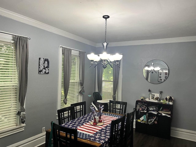 152 Hoyt St, Fond Du Lac, WI 54935 - dining area with a chandelier, crown molding, and wood finished floors