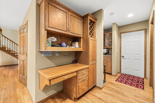 2621 Russet Dr, Plover, WI 54467 - office with built in desk, light wood-style floors, and recessed lighting