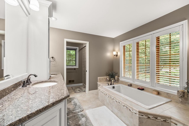 2621 Russet Dr, Plover, WI 54467 - full bathroom with vanity and a bath