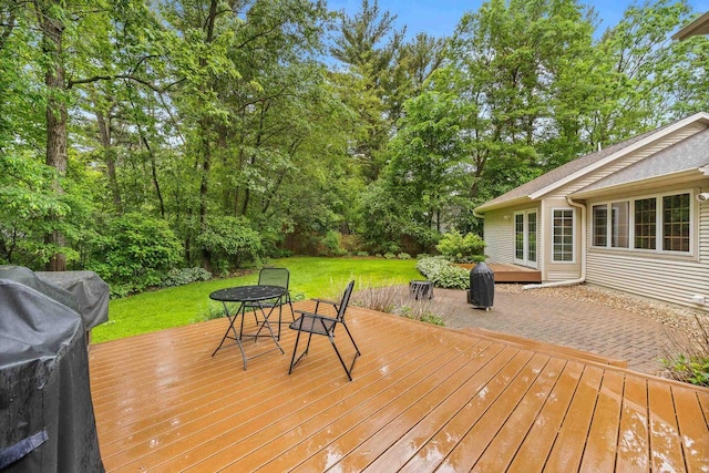 2621 Russet Dr, Plover, WI 54467 - deck with a yard and outdoor dining space