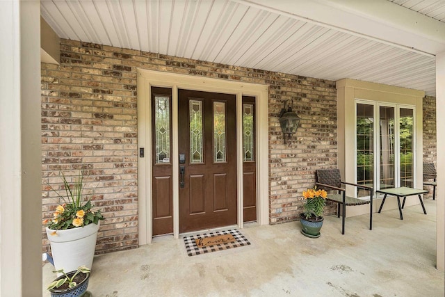 2621 Russet Dr, Plover, WI 54467 - entrance to property featuring brick siding and covered porch