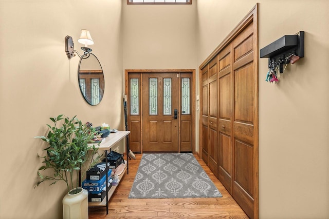 2621 Russet Dr, Plover, WI 54467 - foyer featuring a towering ceiling and wood finished floors