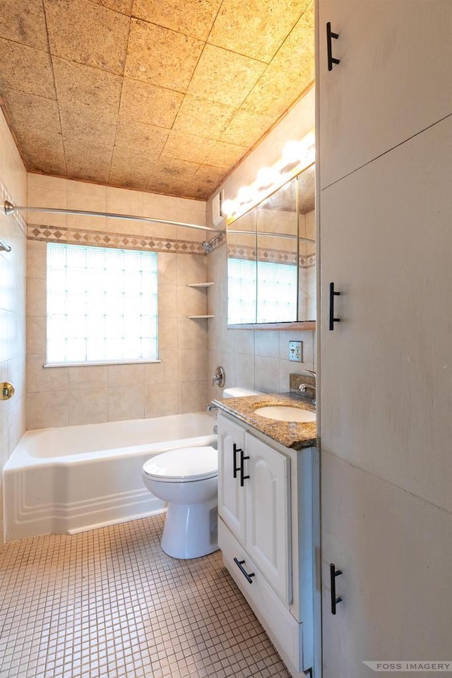 29 S Midvale Blvd, Madison, WI 53705 - bathroom featuring vanity, shower / tub combination, tile patterned flooring, and plenty of natural light