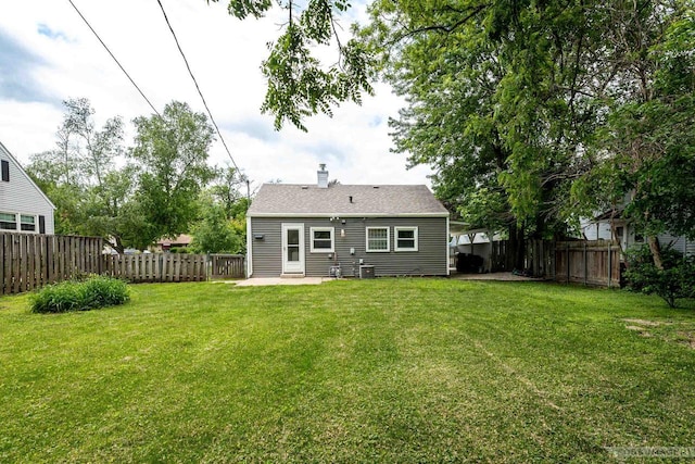 29 S Midvale Blvd, Madison, WI 53705 - rear view of property with a fenced backyard, a chimney, and a patio area