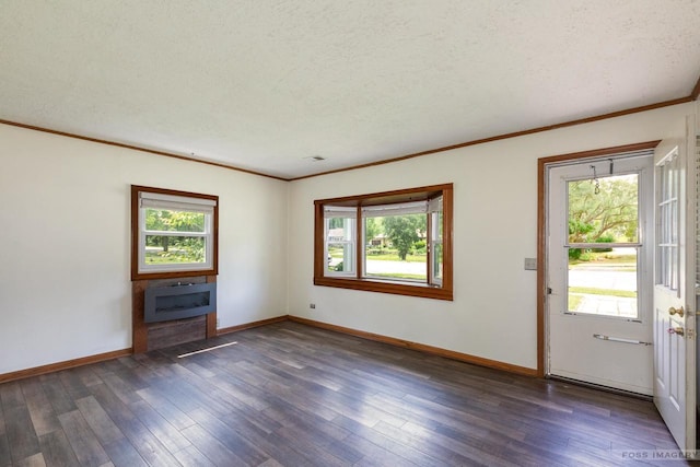 29 S Midvale Blvd, Madison, WI 53705 - entryway featuring plenty of natural light, crown molding, wood finished floors, a textured ceiling, and heating unit
