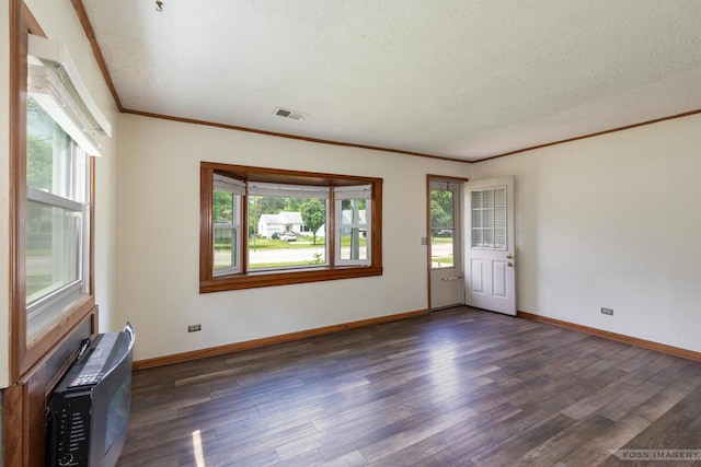29 S Midvale Blvd, Madison, WI 53705 - empty room with healthy amount of natural light, crown molding, wood finished floors, and a textured ceiling