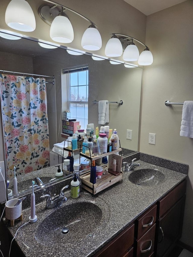 4868-4882 Innovation Dr, Deforest, WI 53532 - bathroom with double vanity and a shower with curtain