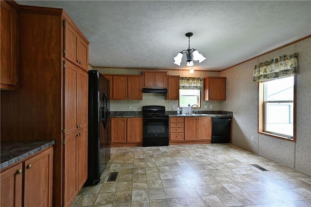 2329 Sand Rd, Shell Lake, WI 54871 - kitchen with black appliances, brown cabinets, a chandelier, plenty of natural light, and ornamental molding