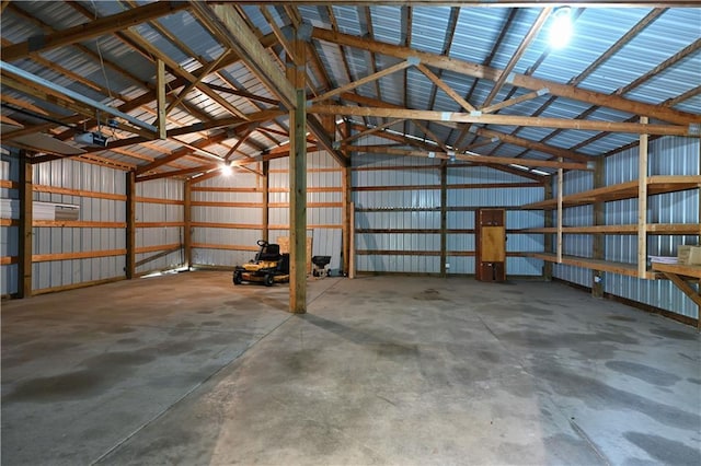 2329 Sand Rd, Shell Lake, WI 54871 - garage featuring a garage door opener and metal wall