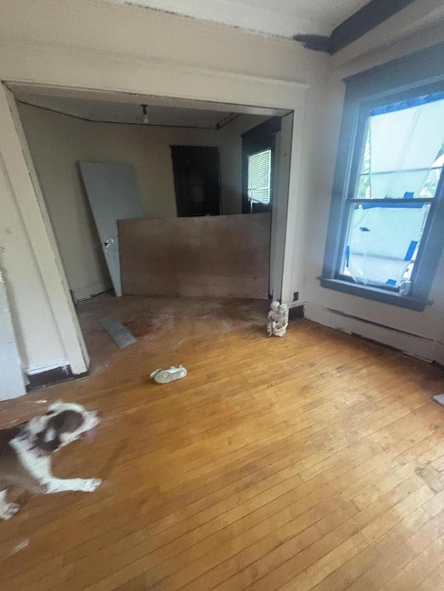 3225 N 24th Pl Unit 3227, Milwaukee, WI 53206 - empty room with light wood finished floors