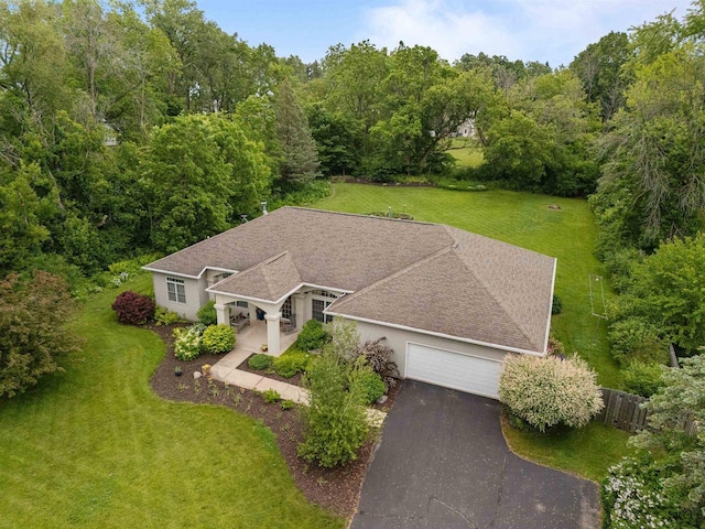 3864 Candlish Harbor Ln, Oshkosh, WI 54902 - view from above of property with a heavily wooded area
