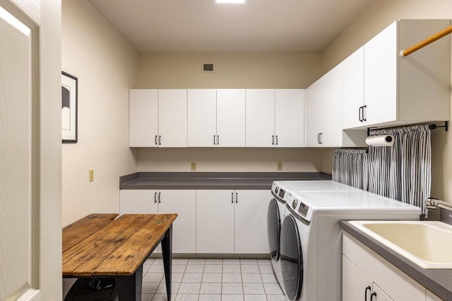 3864 Candlish Harbor Ln, Oshkosh, WI 54902 - washroom with cabinet space, separate washer and dryer, and light tile patterned floors