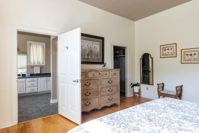 3864 Candlish Harbor Ln, Oshkosh, WI 54902 - bedroom featuring wood finished floors and baseboards