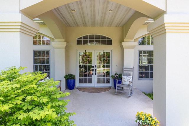 3864 Candlish Harbor Ln, Oshkosh, WI 54902 - view of exterior entry with french doors and stucco siding