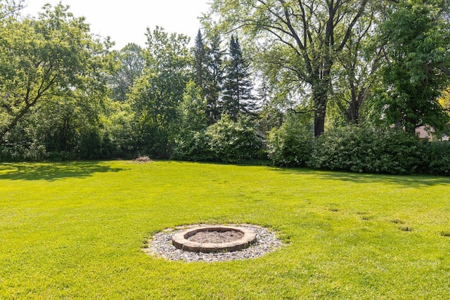 3864 Candlish Harbor Ln, Oshkosh, WI 54902 - view of grassy yard featuring a fire pit